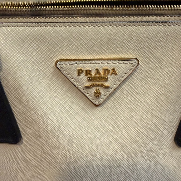 Prada Black and Cream Satchel
Saffiano Leather
Beautiful Handbag - Picture 4 of 12